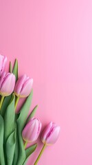 Top view of tulips lying on empty background