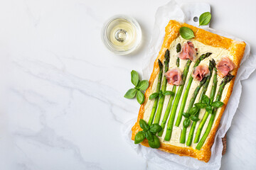 Asparagus puff pastry tart with prosciutto roses and mascarpone or cream cheese. Mother's Day...