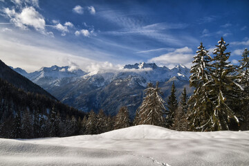 Beautiful snow-capped panorama of the mountains of the Aosta Valley, seen from the slopes above...