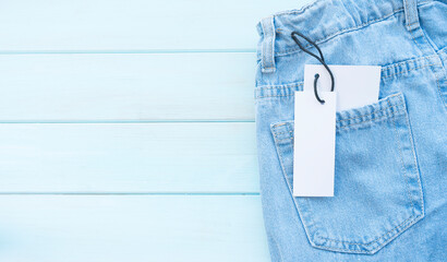 Jeans pocket with attached label