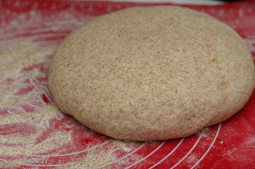 dough formed for bread in the kitchen 4