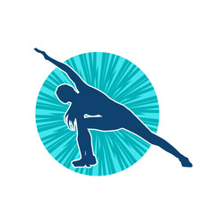 Silhouette of a slim sporty woman doing pilates exercise. Silhouette of a sporty female doing physical exercise. 