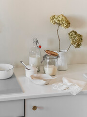 Ingredients for cooking breakfast - semolina, milk on a white background