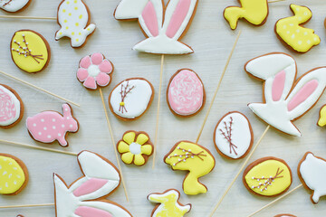 Decor for Easter baking, gingerbread decorated with willow branches. Gingerbread cookies are on the...