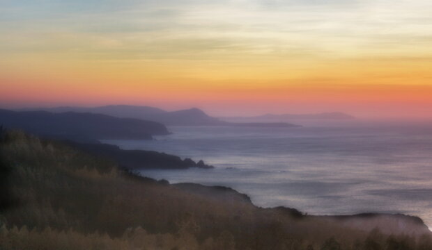sunset on the north coast, sunset with fog, Valdoviño, A Coruña, Galicia, Spain,