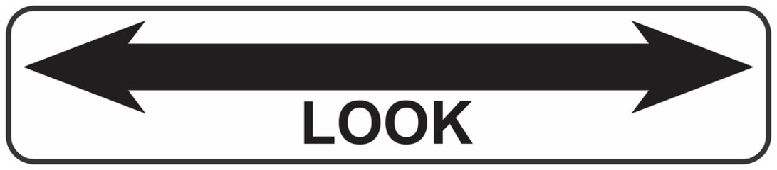 street sign look both ways at track