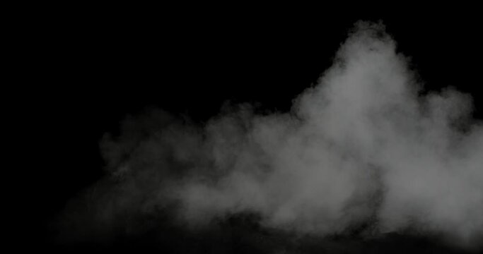 Natural white fog or smoke on dark copy space background in slow motion. Cloud of cold fog in light spot, ice smoke cloud. Animated realistic video concept