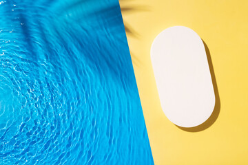 Mock up podium or pedestal flat lay on yellow background with blue water waves.