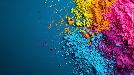 Colorful Holi festival colors over plain surface