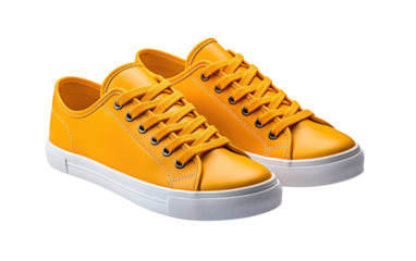 A Pair of Yellow Sneakers. This photo depicts a pair of yellow sneakers placed neatly The sneakers showcasing their color and simple design. on a White or Clear Surface PNG Transparent Background.
