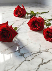 Red roses strewn on shiny marble floor. Long stemmed roses on reflective white floor 