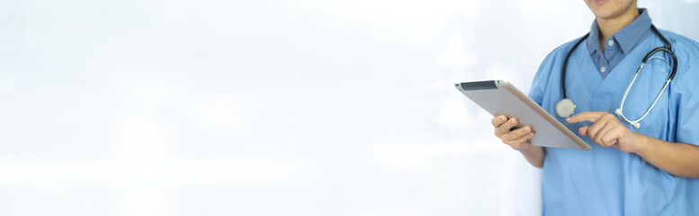 Doctor working on a digital tablet white spec background