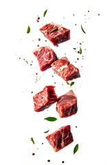 Slices of Fresh raw beef meat levitation isolated on white background