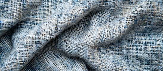 Macro close up of vibrant blue fabric texture with intricate pattern for design inspiration and backgrounds