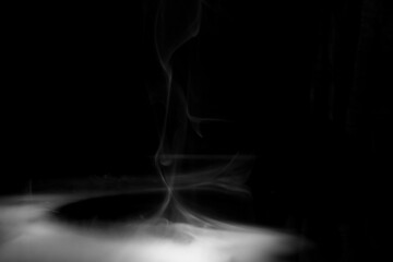 thick white smoke, plumes of smoke in the dark, smoke on a black background