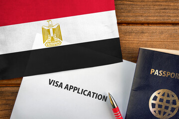 Visa application form, passport and flag of Egypt
