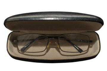 Close up view of a eyeglasses in a case isolated