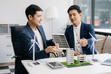 Discussion among businesspeople on the latest developments in solar cell panel technology and Solar...