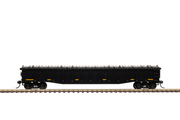 A Black Covered Railroad Gondola Car On Train Track