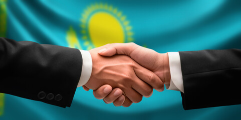 Businessman, diplomat in suits clasp hands for handshake over Kazakhstan flag, agree on united success in trade, diplomacy, cooperation, negotiation, teamwork in commerce, gesture of greeting