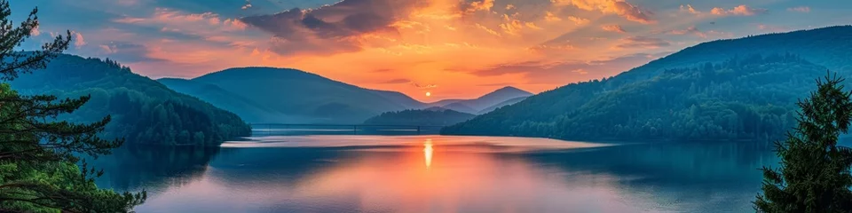 Foto op Aluminium A beautiful sunset over a lake with mountains in the background, AI © Alexandr
