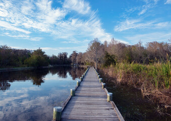 Wooden Walkway in Florida Park along Lake