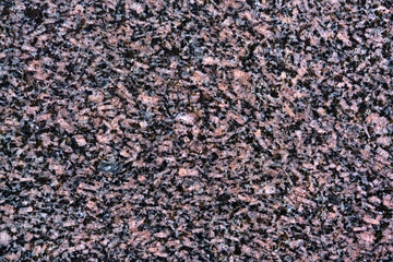 Granite Texture, Red Base with Black and Gray Spots. close up
