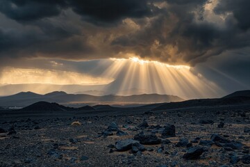 Stunning muscular creeping rays pierce through the stormy clouds above the landscape.