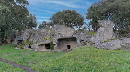 Fototapeta na wymiar Domus de Janas necropolis Ludurru - fairy house, prehistoric stone structure typical of Sardinia .