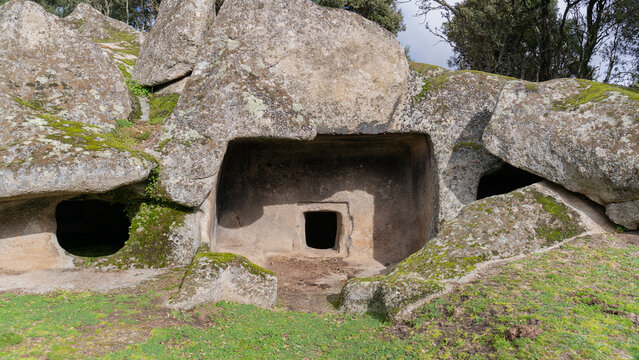Domus de Janas necropolis Ludurru - fairy house, prehistoric stone structure typical of Sardinia .