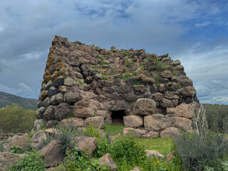 Nuraghe Luche in Illorai in central Sardinia, particular partially collapsed single tower