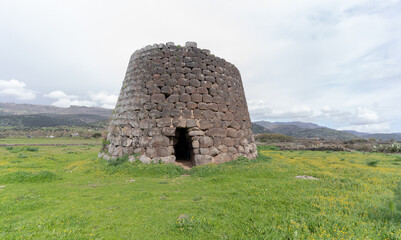 Nuraghe Santa Sabina in Silanus in central Sardinia with the church of Santa Serbana next to it