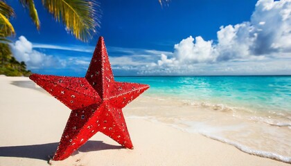 Fototapeta na wymiar christmas red star on caribbean beach