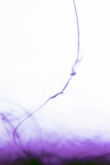 Obraz premium water soluble violet photo There are patterns created by the flow of paint in the water.