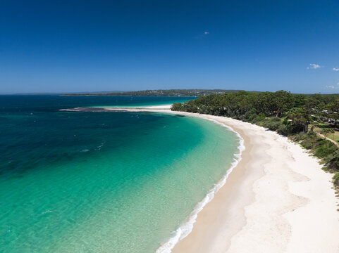 High angle aerial drone view of Huskisson Beach in Huskisson, a beachside suburb in Jervis Bay Territory on the South Coast of New South Wales, Australia. Popular tourism destination fpr Sydneysiders.