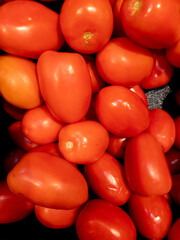 Fresh red tomatoes on the market. Organic farm produce. 