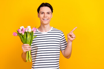 Photo of preppy student dressed striped t-shirt hold bouquet of flowers indicating at sale empty...