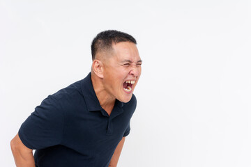 Side view of an angry middle aged asian man screaming from the top of his lungs. Copyspace on the right, on a white background.