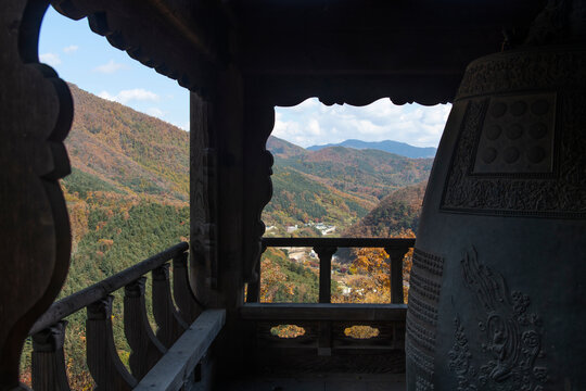 landscape of the autumn mountain from the pavilion of bell in the Buddhist temple