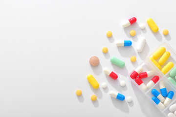 A large number of drugs and medicine boxes on a white background. Medical Health Concept