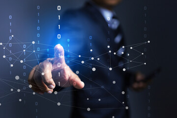 businessman pointing on binary code rising above represent to communication and data transfer with...