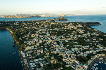 Fototapeta premium Procida,Italy - September 28 , 2019: characteristic houses of Procida with tourists and inhabitants - Italy