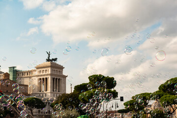 soap bubbles in the sky in the street of the imperial forums, Rome