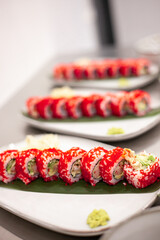 California sushi roll on a plate with decoration