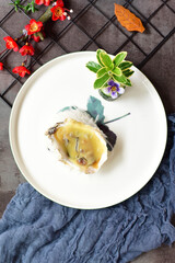 Seafood cheese oysters placed on a plate