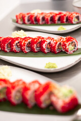 California sushi roll on a plate with decoration