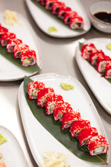 California sushi roll on a plate with decoration