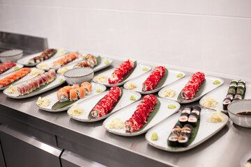 California sushi roll on a plate with decoration