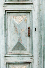 Ancient Wooden portal of a historic palace in Italy