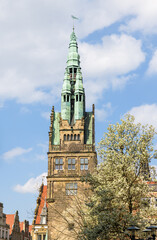 Fototapeta premium The tower of the St. Martini Church in the old town of Munster in Germany during spring.